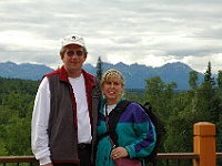 DSC 6573 adj  On the porch of Princess' Mt McKinley Lodge. Too many clouds to see Denali on this day.